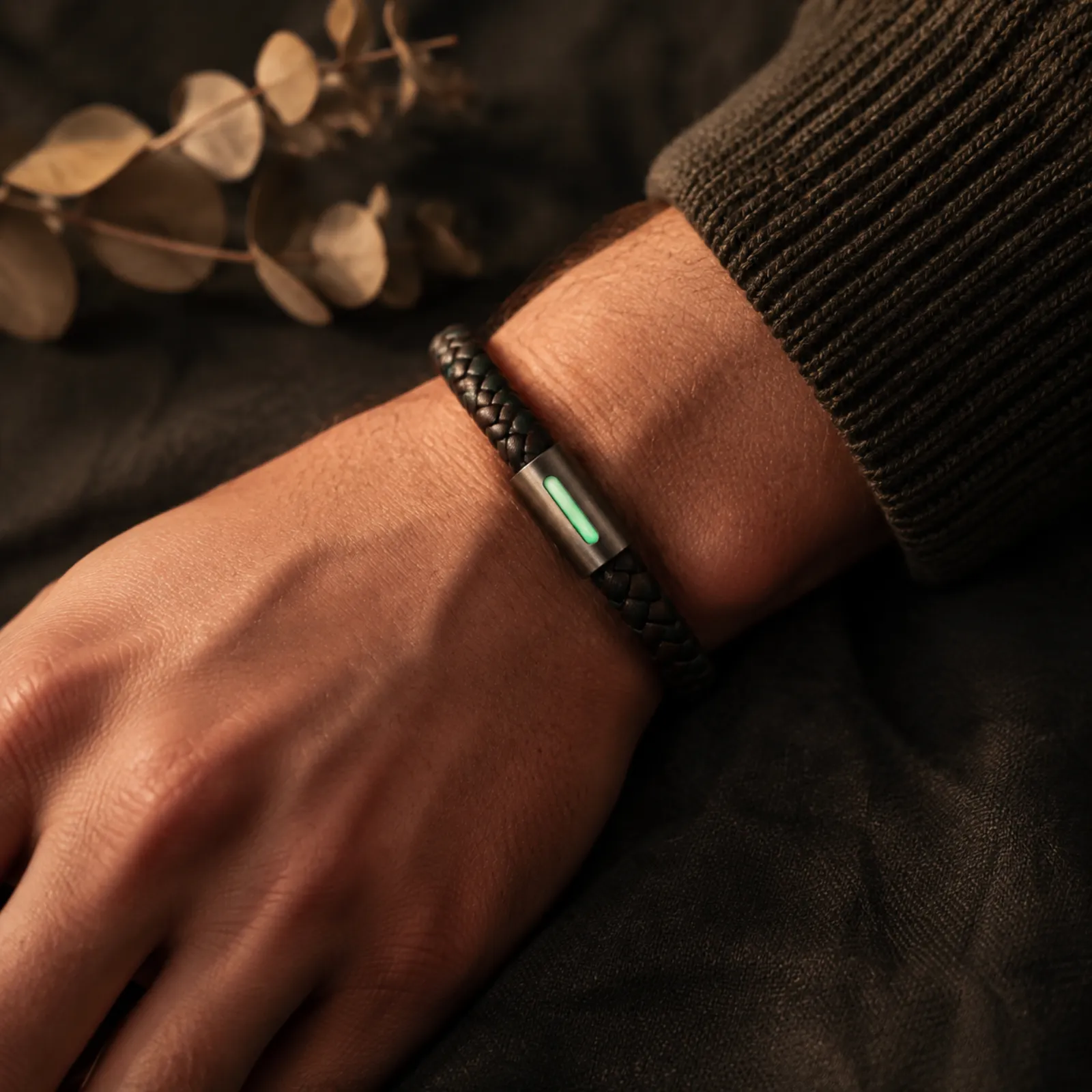 Woven LoveBand bracelet with a softly glowing module